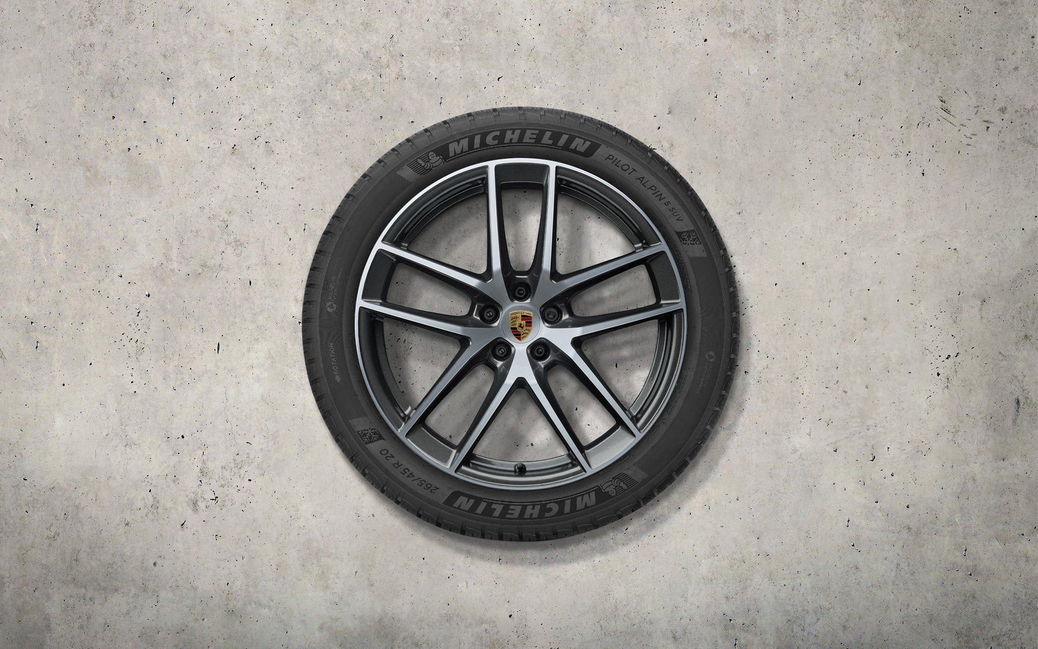 20-inch Macan S winter wheel-and-tire set, bright-polished in Dark Titanium