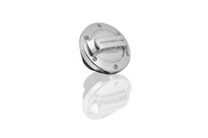 Fuel cap in aluminium look with “Porsche” Logo and retaining strap