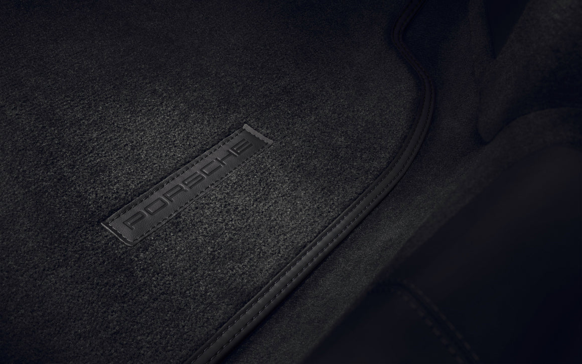 Floor mats with leather trim