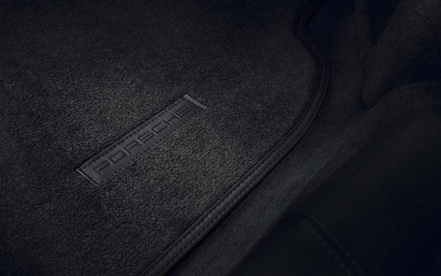 Floor mats with leather trim