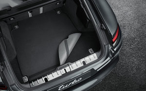 Reversible luggage-compartment mat with Nubuk surround