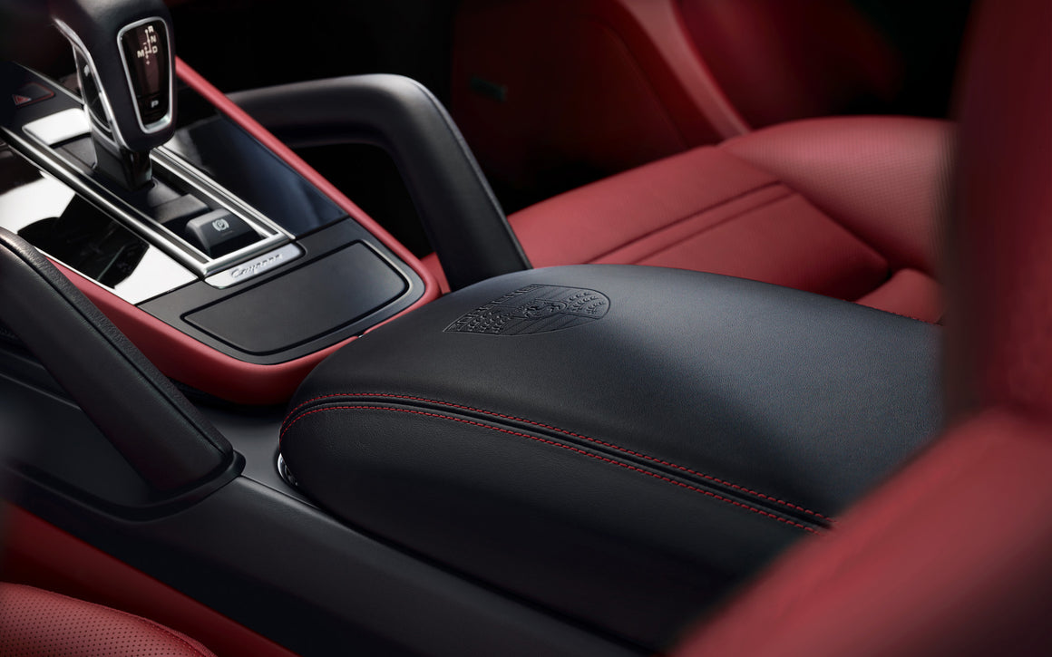 Center console armrest with Porsche Crest